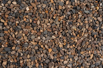 Sea pebbles. Background of pebbles. Multicolored pebbles.