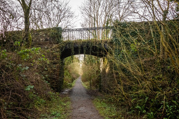 Fototapeta na wymiar Road bridge at Lodge of Kelton over the old Paddy Line or Galloway railway line