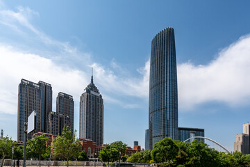 Fototapeta na wymiar Street View of modern architecture along Haihe River in Tianjin