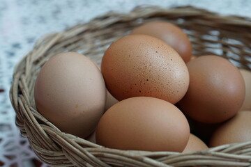 Close up of chicken eggs in basket