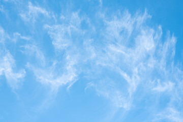 clear blue sky with light clouds soft focus