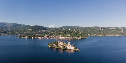Aerial panoramic view over San Giulio Island on Lake Orta, Piedmont.