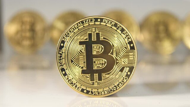Golden bitcoin, close up.