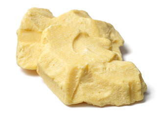 raw cocoa butter isolated on white background