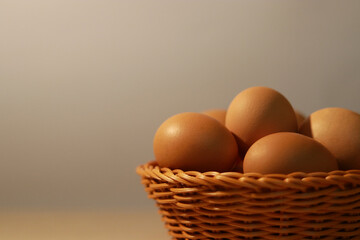Egg in basket on the table