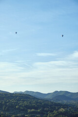 Fototapeta na wymiar balloons flying over la garrotxa at dawn