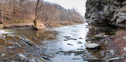 The Czarny Potok stream flowing next to the cave in Rosolina, Polana, Bieszczady Mountains - obrazy, fototapety, plakaty