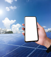 Mockup Mobile phone holding in hand with blurred solar roof background, concept for using smart devices with solar system at home, at work, on application and in daily life.