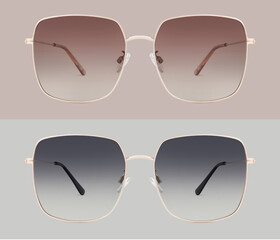 sunglasses golden metallic frame and brown and gray polarized lenses isolated on background