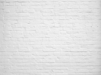 Old Brick wall painted with white paint.