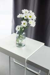 Flowers in vase in home interior