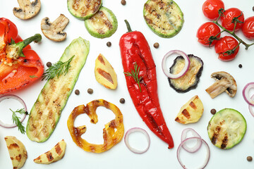 Tasty grilled vegetables on white background, top view