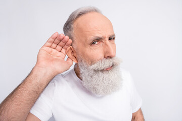 Portrait of sad grey hair beard old man not hear wear white t-shirt isolated on grey color background