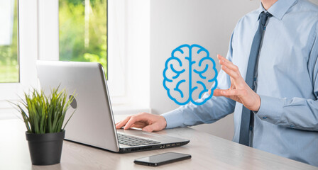 Businessman holding abstract brain and icon tools, device, customer network connection communication on virtual , innovative development future technology, science, innovation and business concept.