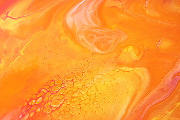 Abstract fluid art background dark orange and yellow colors. Liquid marble. Acrylic painting with...