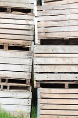 stack of old wooden bins