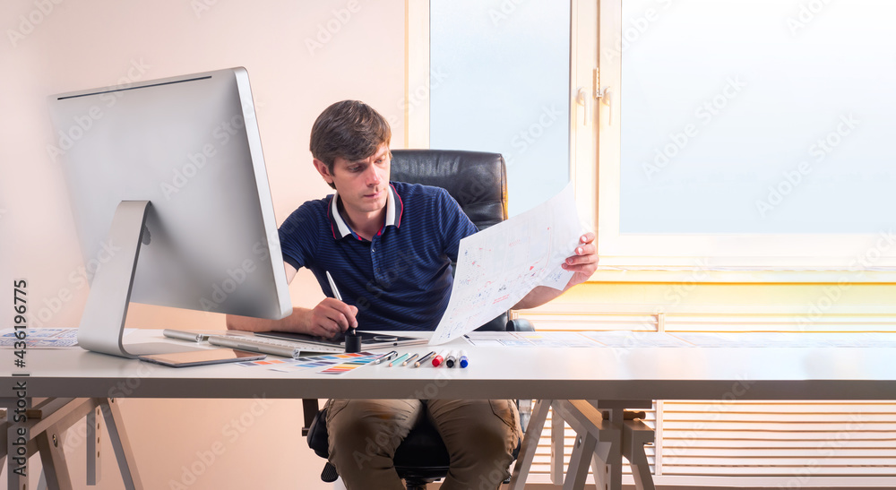 Poster mobile app designer in the dashboard. a person looks at a mobile app template. ui / ux interface of 
