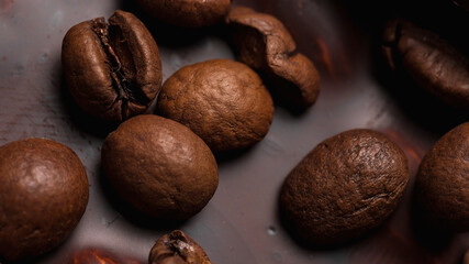 Coffee beans and chocolate close-up. Natural brown background.