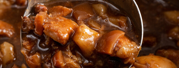 Cooking braised pork for eating with rice. Taiwanese traditional food.