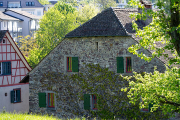 Fototapeta na wymiar Old medieval buildings at Zurich Witikon. Photo taken May 28th, 2021, Zurich, Switzerland.