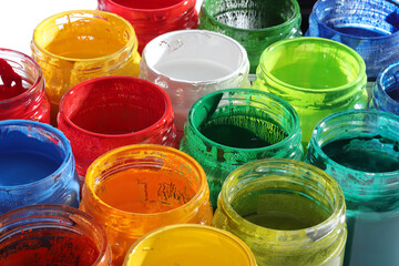 various paints in glass bottle
