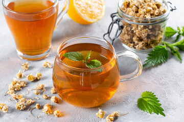 Home herbs tea. Chamomile and herbal tea with nettle, relaxation and detox