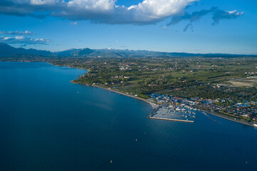 Aerial panorama of the city of Peschiera del Garda on Lake Garda, Italy. Aerial view of the coastal part of the city of peschiera del garda. Italian resorts on Lake Garda.