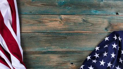 Stars and strips of American flag on faded blue wood for happy Independence, labor and Memorial Day holidays in the United States