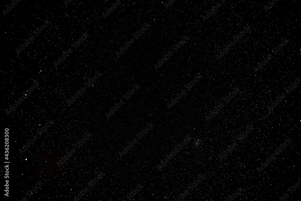 Wall mural stars on a clear and black sky