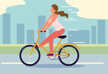 woman riding bicycle in city