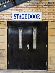 Stage Door sign and door