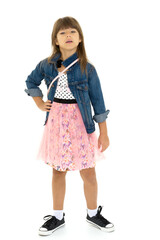 Pretty girl in stylish outfit with hand on waist