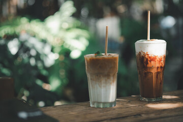 Glass of iced latte coffee and iced mocha at outdoor cafe
