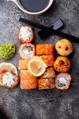 sushi roll set served  at grey table. flat lay. close up