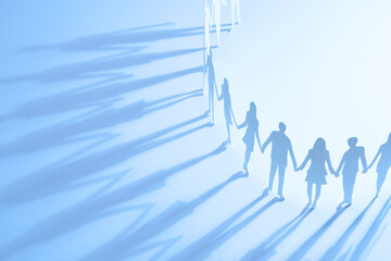 手をつなぐ人のシルエット