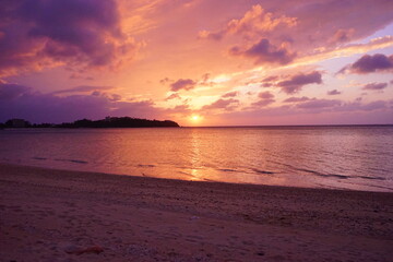 Naklejka na ściany i meble Koki beach at sunset in Okinawa, Japan - 幸喜ビーチの夕日 沖縄 日本 