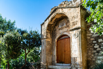 Fototapeta na wymiar Old Gate of Medrese (Madrasa) in Athens, Greece. Built in 1721, during the Ottoman rule, later used as a jail. A medrese is an Islamic school.