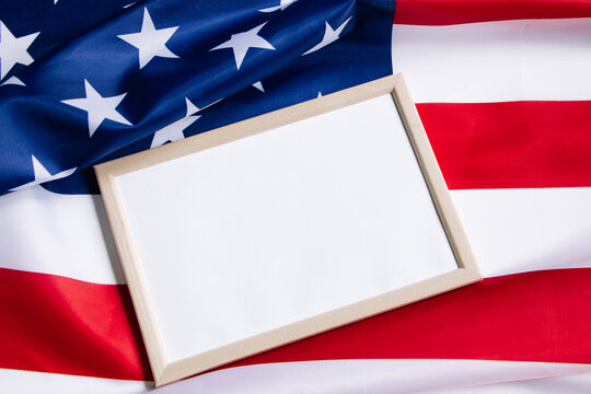 American flag and empty frame for text. Independence, Memorial Day. Culture of the USA.