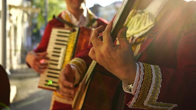 Mexican musicians mariachi band street concert	