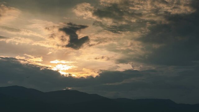 After the storm there must be a calm, Sunset after the storm with a little bird fly over the sky.