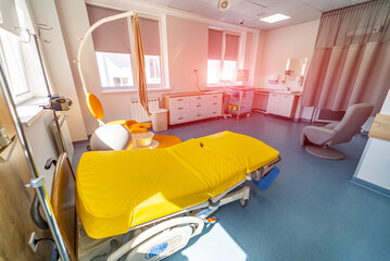 Hospital baby health care. Modern patient beds in a maternity ward.