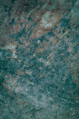 Abstract stone texture  with stains, natural lines and granulation. Dark tones textured background with copy space.