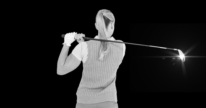 Composition of caucasian female golf player with golf club and copy space in black and white