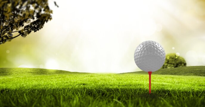 Composition of golf ball in grass on red tee and copy space