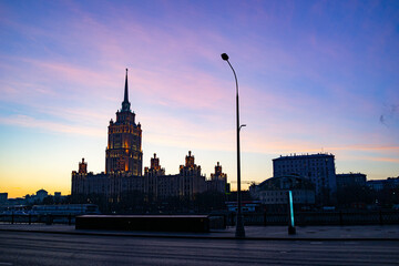 Fototapeta premium Moscow,Russia-Nov 15,2019: Moscow morning in winter time, Raddisson Hotel on the screen with sunrise sky background.