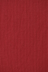 Vertical shot of red knitting cloth pattern texture