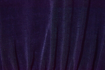 Closeup shot of dark-blue fabric curtain used for wallpaper or background - obrazy, fototapety, plakaty