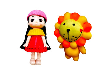 girl doll and animal themed doll on white background