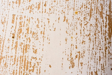 Background of rusty metal wall covered with paint peeling off