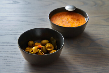 Big spanish olives with gazpacho soup
